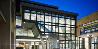 exterior view of Swanson School of Engineering building at night on Pitt campus